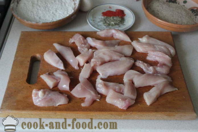 Ketulan dilapisi tepung roti dada ayam dan goreng dalam kuali - bagaimana untuk membuat ketulan ayam dari rumah, langkah demi langkah resipi foto